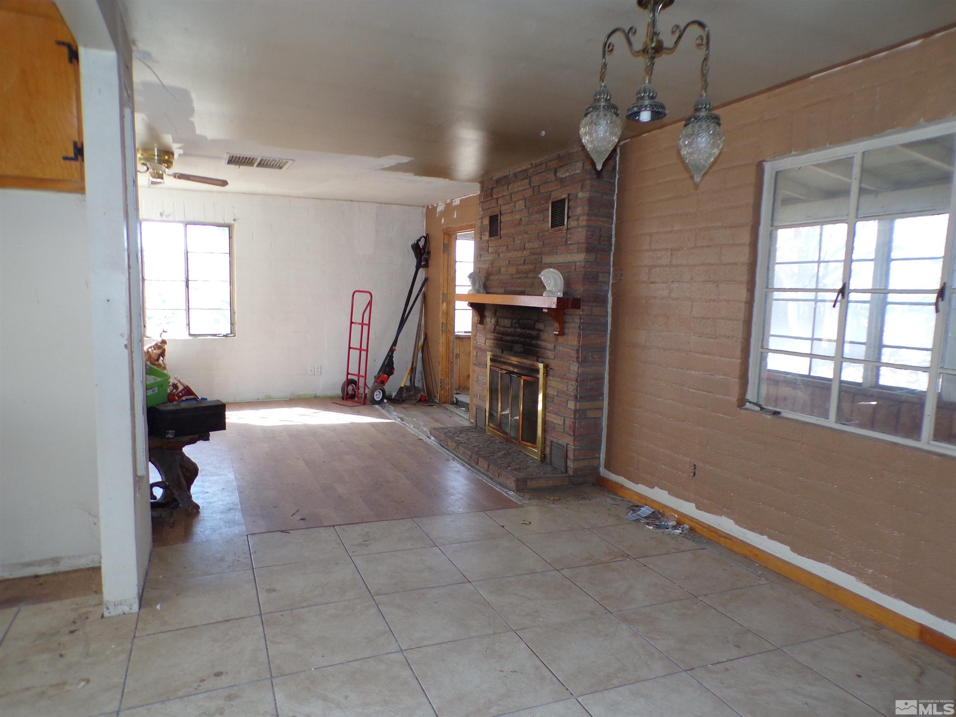 5890 Rivers Edge Drive Fallon, NV 89406 - Photo 4 of 24 a bed room with a bed and a window