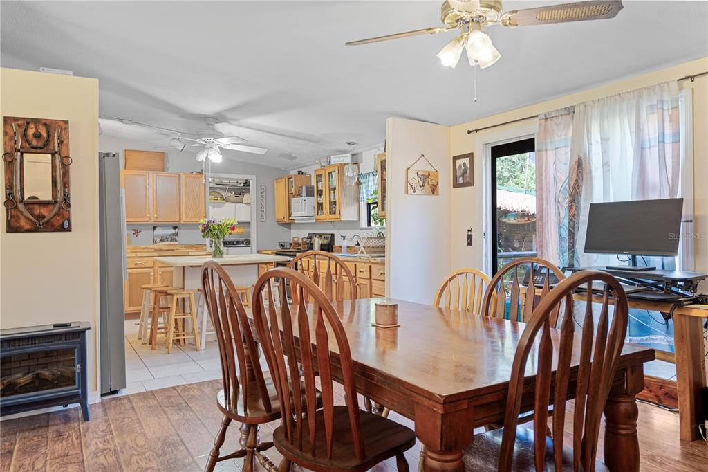 7201 Northeast 132nd Place Citra, FL 32113 - Photo 13 of 37 a dining room with furniture and window