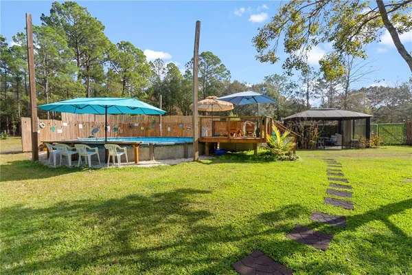a view of a house with swimming pool