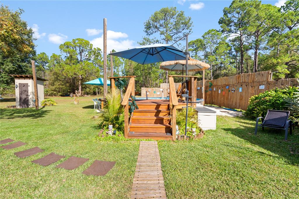 7201 Northeast 132nd Place Citra, FL 32113 - Photo 22 of 37 a view of a swimming pool with a patio