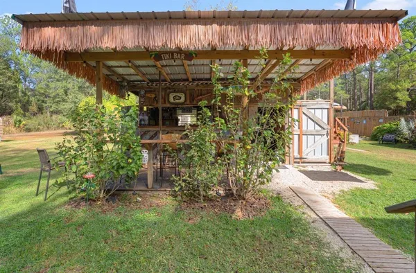 a view of a back yard of the house