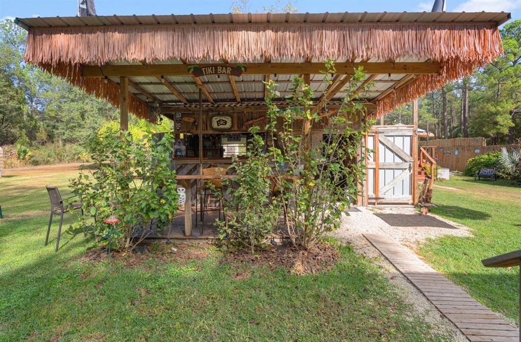 7201 Northeast 132nd Place Citra, FL 32113 - Photo 23 of 37 a view of a back yard of the house