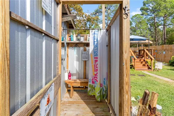 a balcony view with a outdoor seating space