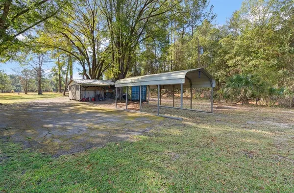 a house with trees in the background