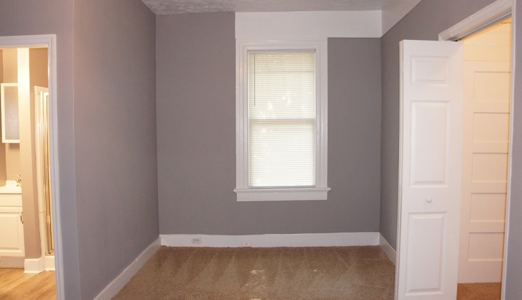 1336 19th Street Columbus, GA 31901 - Photo 12 of 20 a view of an empty room with a window