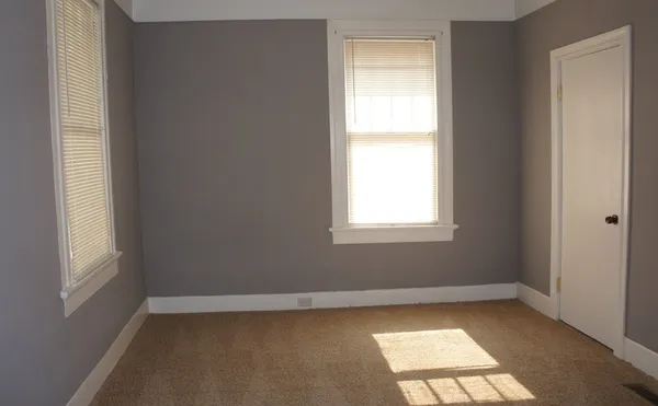 an empty room with a window
