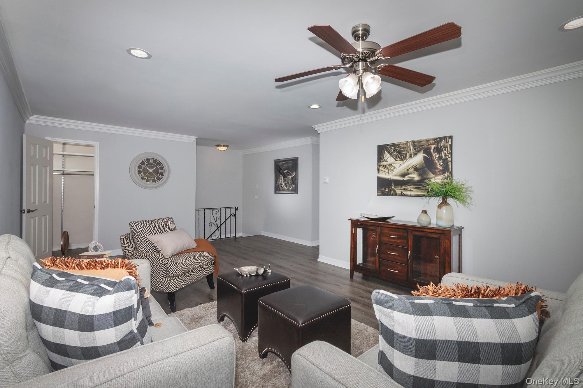 70 Middleton Road, Unit SF05 Bohemia, NY 11716 - Photo 6 of 9 a living room with furniture and a table