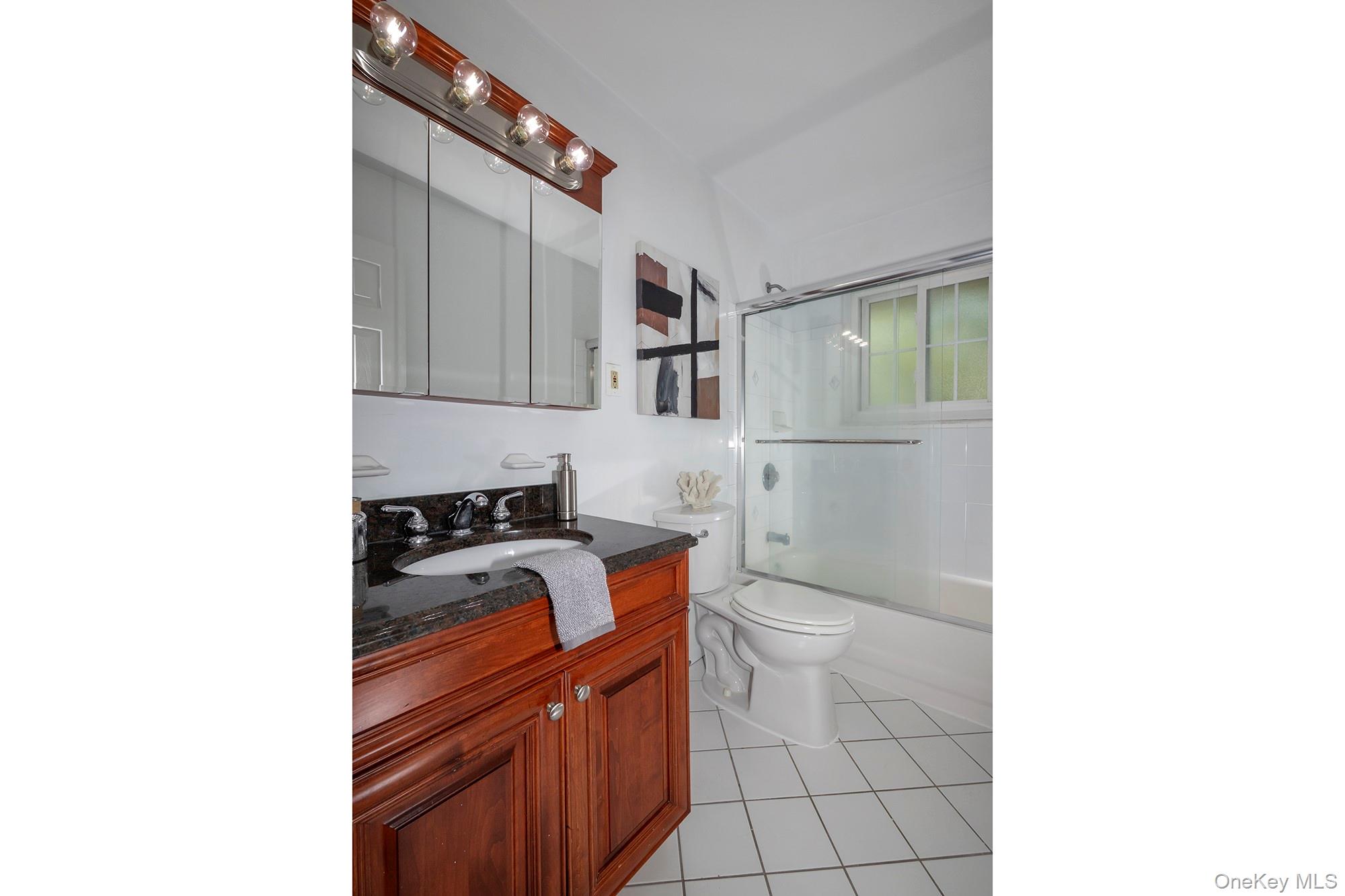 70 Middleton Road, Unit SF05 Bohemia, NY 11716 - Photo 9 of 9 a kitchen with a sink cabinets and appliances