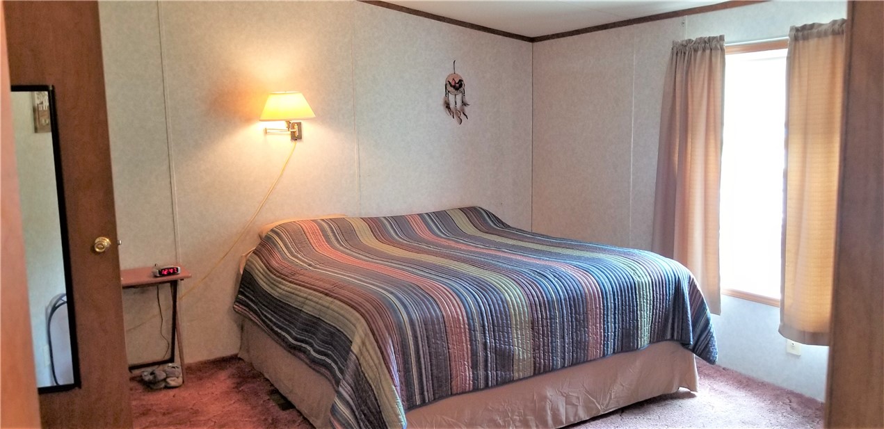 1779 Ross Road, Unit 55 Lyons, NY 14489 - Photo 8 of 15 Primary Bedroom