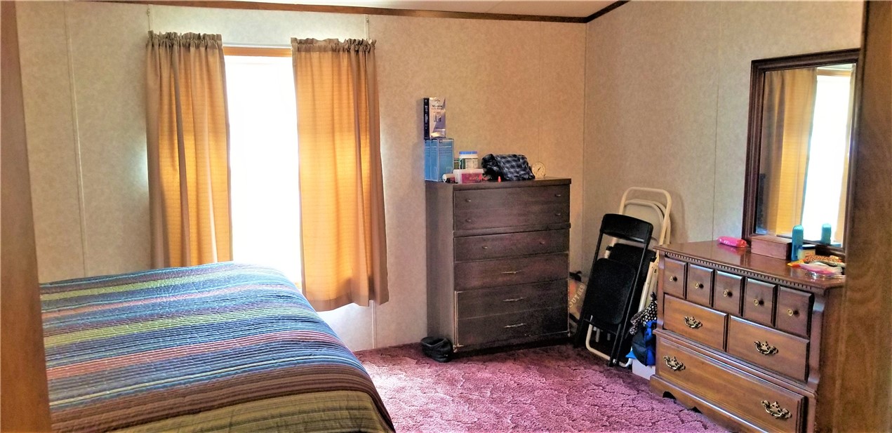 1779 Ross Road, Unit 55 Lyons, NY 14489 - Photo 9 of 15 Primary Bedroom