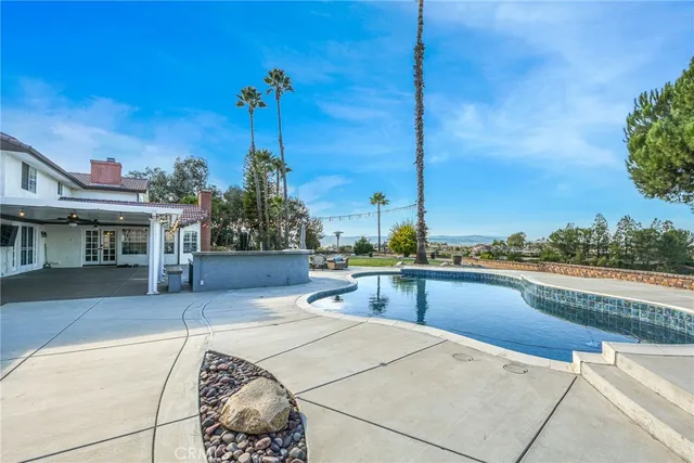 a view of a golf course with a lake view