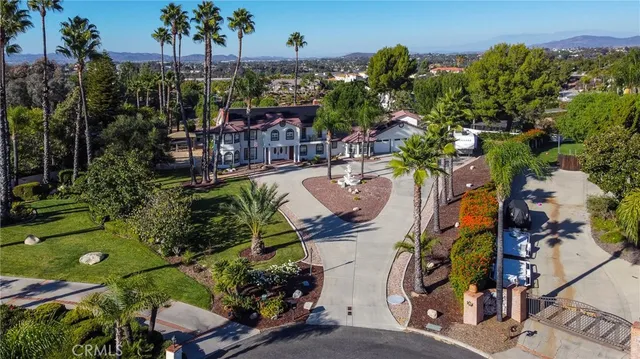 a view of a town with mountains in the background