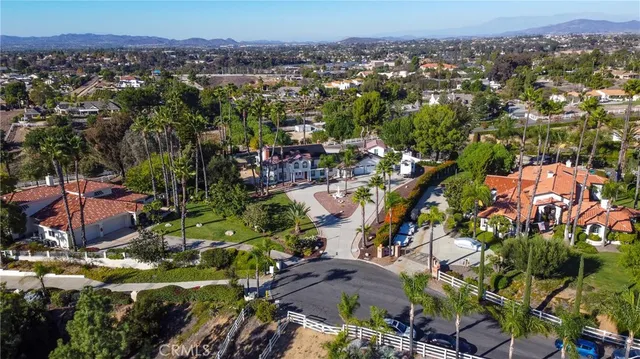 an aerial view of residential house and outdoor space