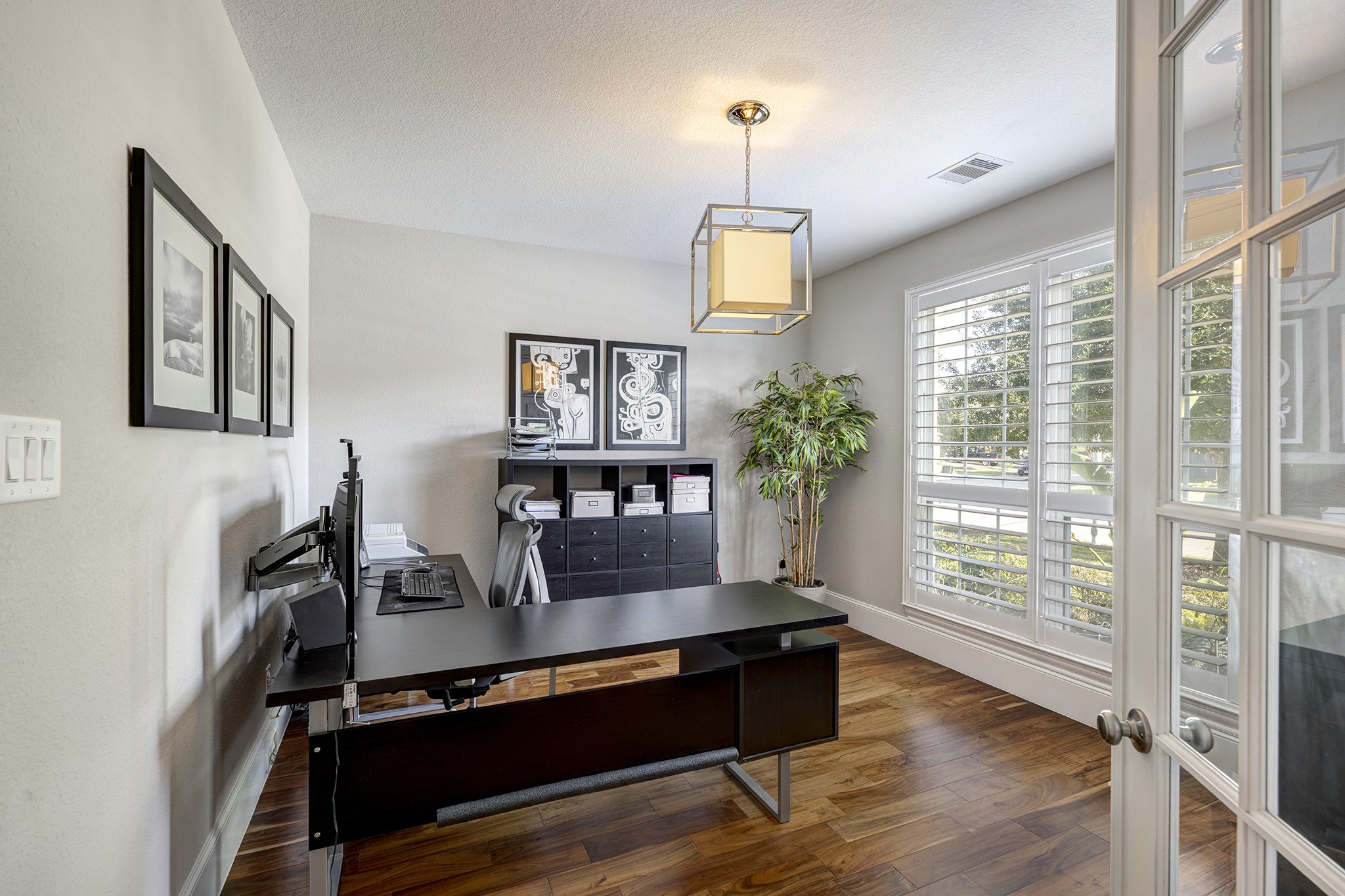 5002 Harvest Knoll Drive Spring, TX 77389 - Photo 7 of 48 Home Office/Study can easily be closed off by French Doors. Custom Plantation Shutters and light fixture.