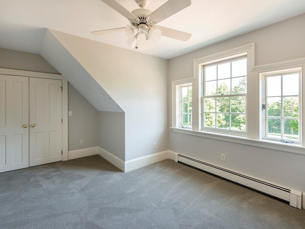 56 Strawberry Ridge Lane Cumberland Center, ME 04021 - Photo 24 of 27 Guest bedroom with brand new carpet.