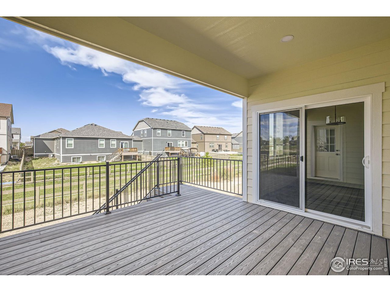 345 Central Avenue Severance, CO 80550 - Photo 3 of 10 a view of outdoor space with wooden floor