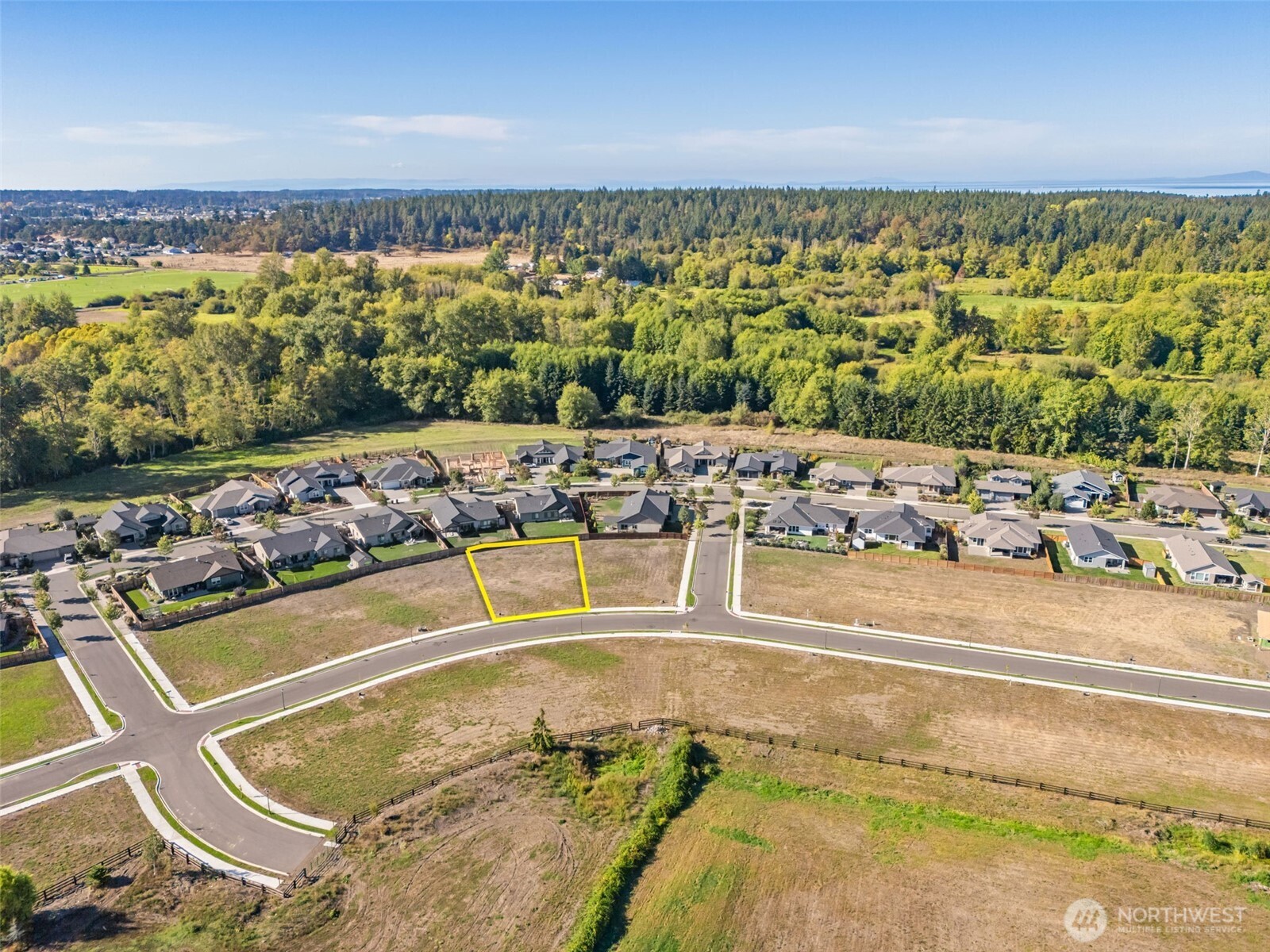 100 Dover Lane Sequim, WA 98382 - Photo 5 of 18 a view of a swimming pool and an ocean view