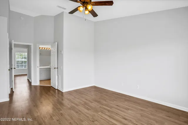 a view of a livingroom with wooden floor