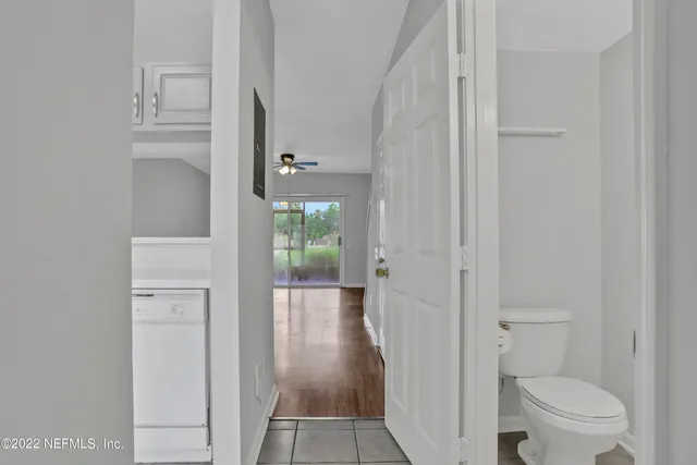 a bathroom with white walls