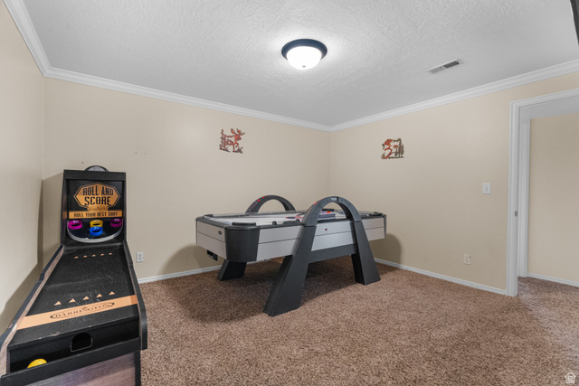 5727 South 3550th Street West Roy, UT 84067 - Photo 26 of 49 Spacious room with light neutral wall paint, white crown molding, and textured ceiling
