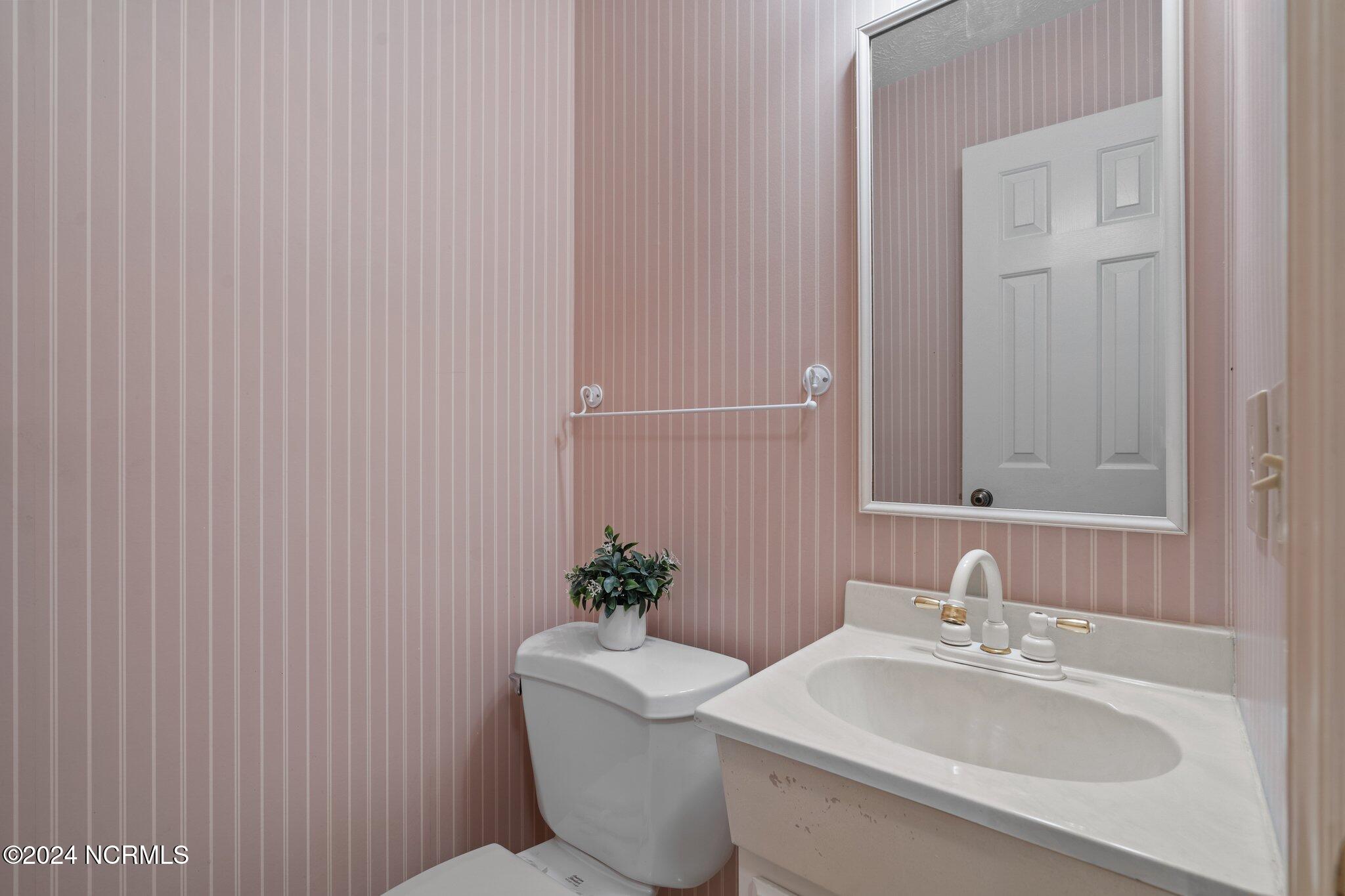 3916 Niagara Carthage Road Whispering Pines, NC 28327 - Photo 43 of 47 half bathroom