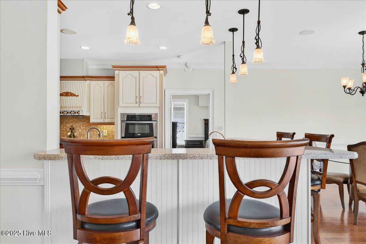 1019 Ridgewood Drive North Myrtle Beach, SC 29582 - Photo 12 of 49 Wrap-Around Bar in Kitchen