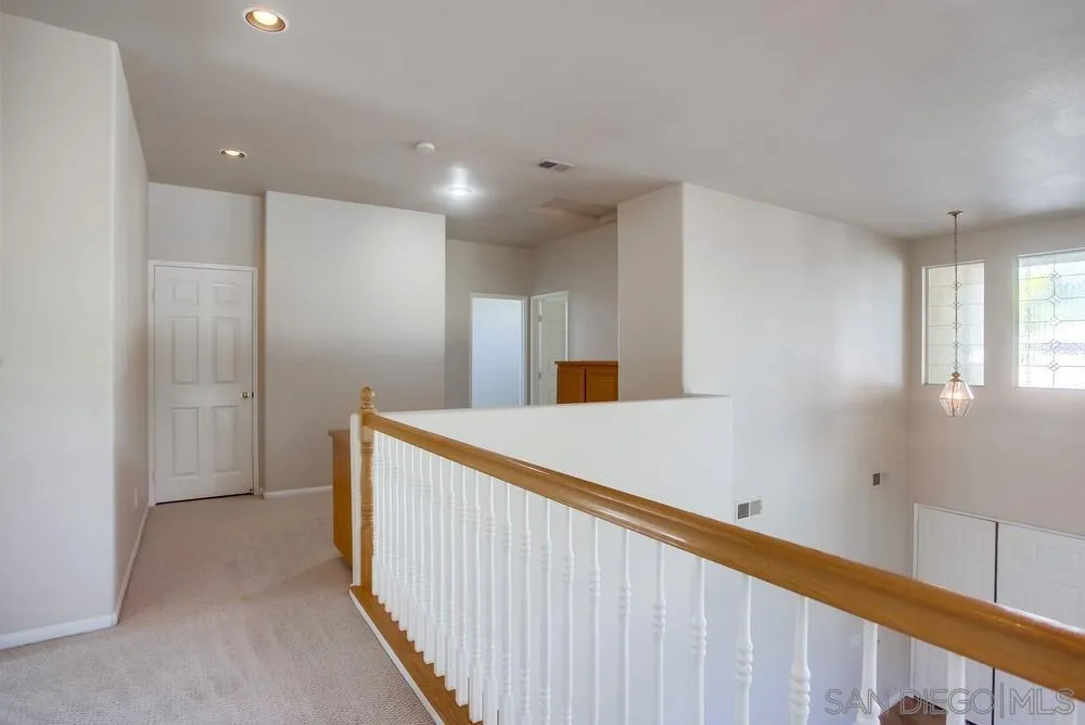 5163 Riverview Court Fallbrook, CA 92028 - Photo 26 of 75 a view of a hallway with seating area