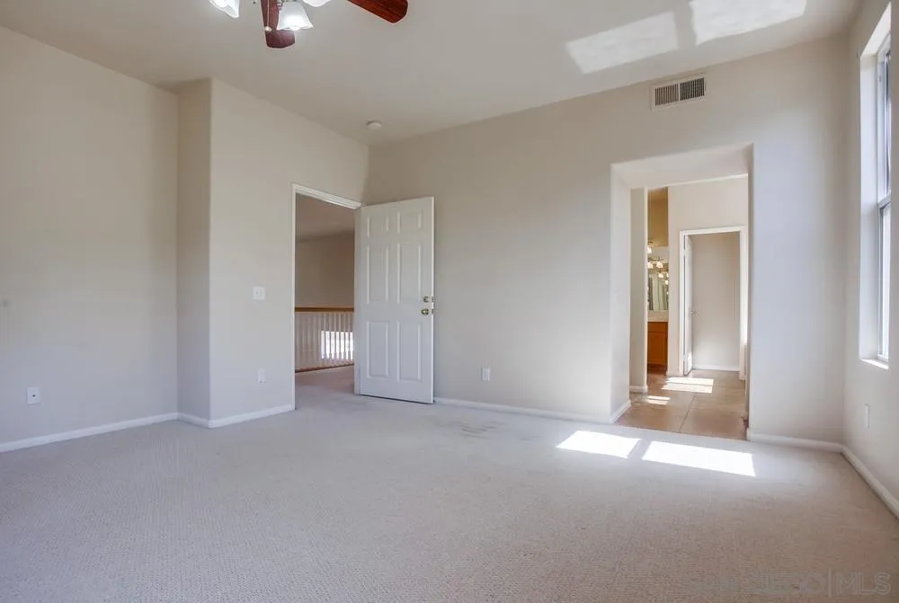 5163 Riverview Court Fallbrook, CA 92028 - Photo 35 of 75 a view of an empty room with a window