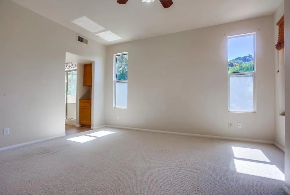 5163 Riverview Court Fallbrook, CA 92028 - Photo 36 of 75 an empty room with windows and closet