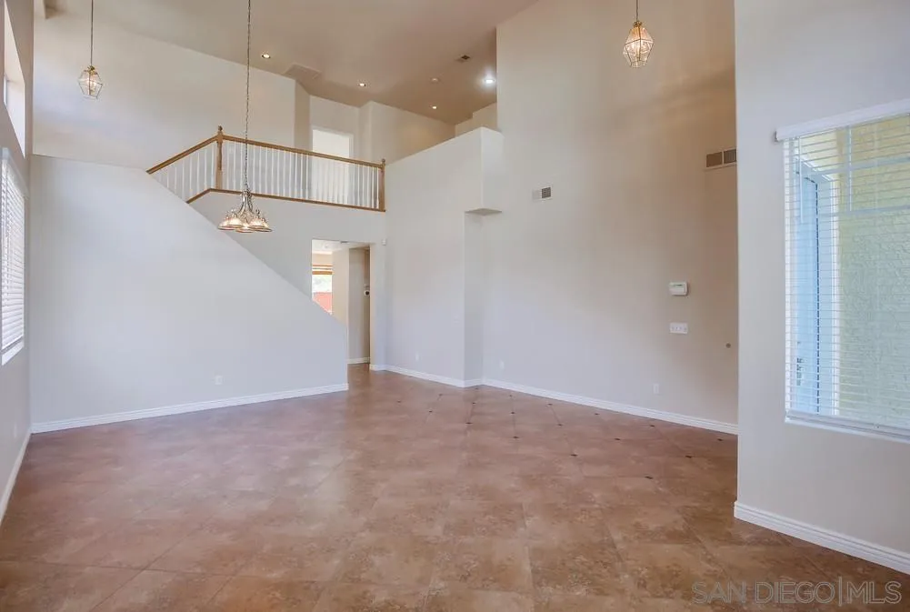 5163 Riverview Court Fallbrook, CA 92028 - Photo 4 of 75 a view of an empty room with a window