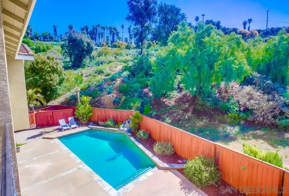 5163 Riverview Court Fallbrook, CA 92028 - Photo 48 of 75 a view of a backyard with seating area