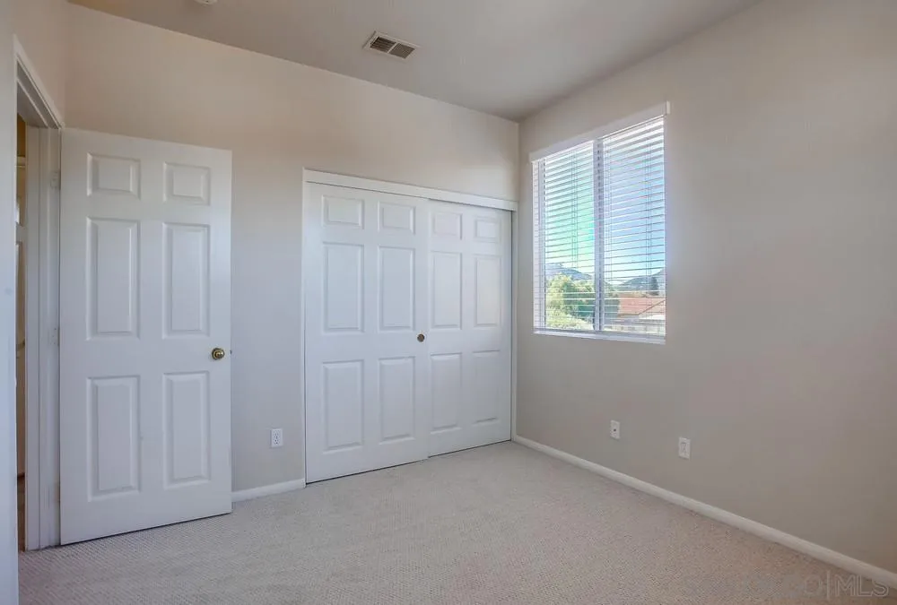 5163 Riverview Court Fallbrook, CA 92028 - Photo 52 of 75 an empty room with windows