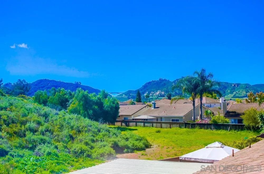 5163 Riverview Court Fallbrook, CA 92028 - Photo 53 of 75 a view of a house with a yard and a swimming pool