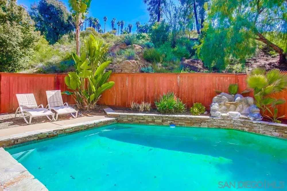 5163 Riverview Court Fallbrook, CA 92028 - Photo 69 of 75 a view of a backyard with plants and a patio