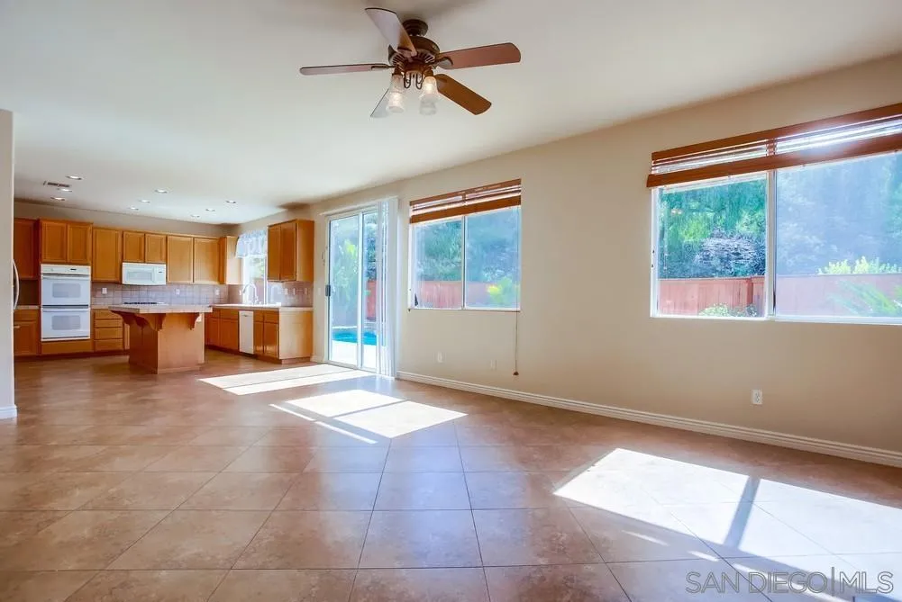 5163 Riverview Court Fallbrook, CA 92028 - Photo 10 of 75 a view of a kitchen with furniture and a window