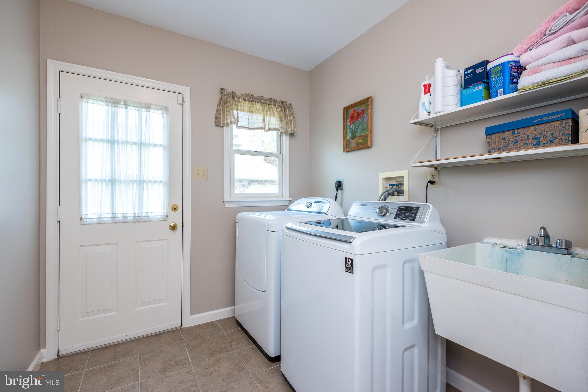 110 Broad Acres Road Lansdale, PA 19446 - Photo 22 of 41 Large Mud Room with Exit to Side of Home