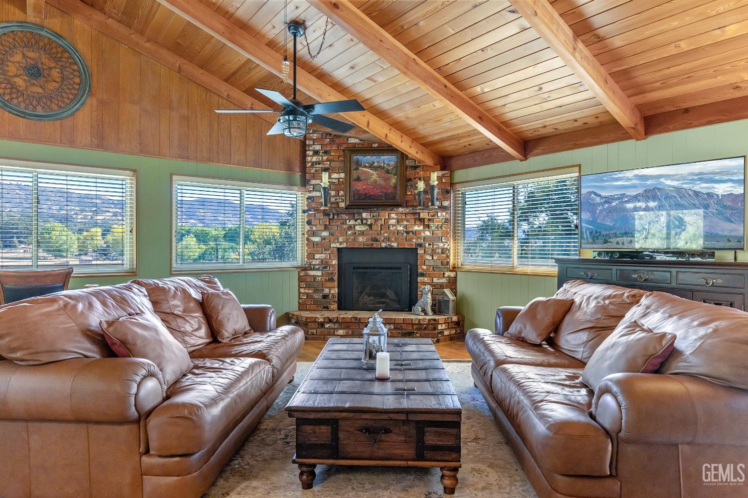 Undisclosed Address Tehachapi, CA 93561 - Photo 11 of 58 a outdoor living space with furniture and a fireplace