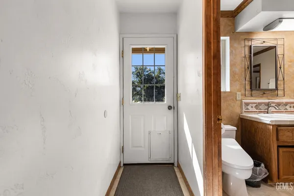 a bathroom with a shower and toilet