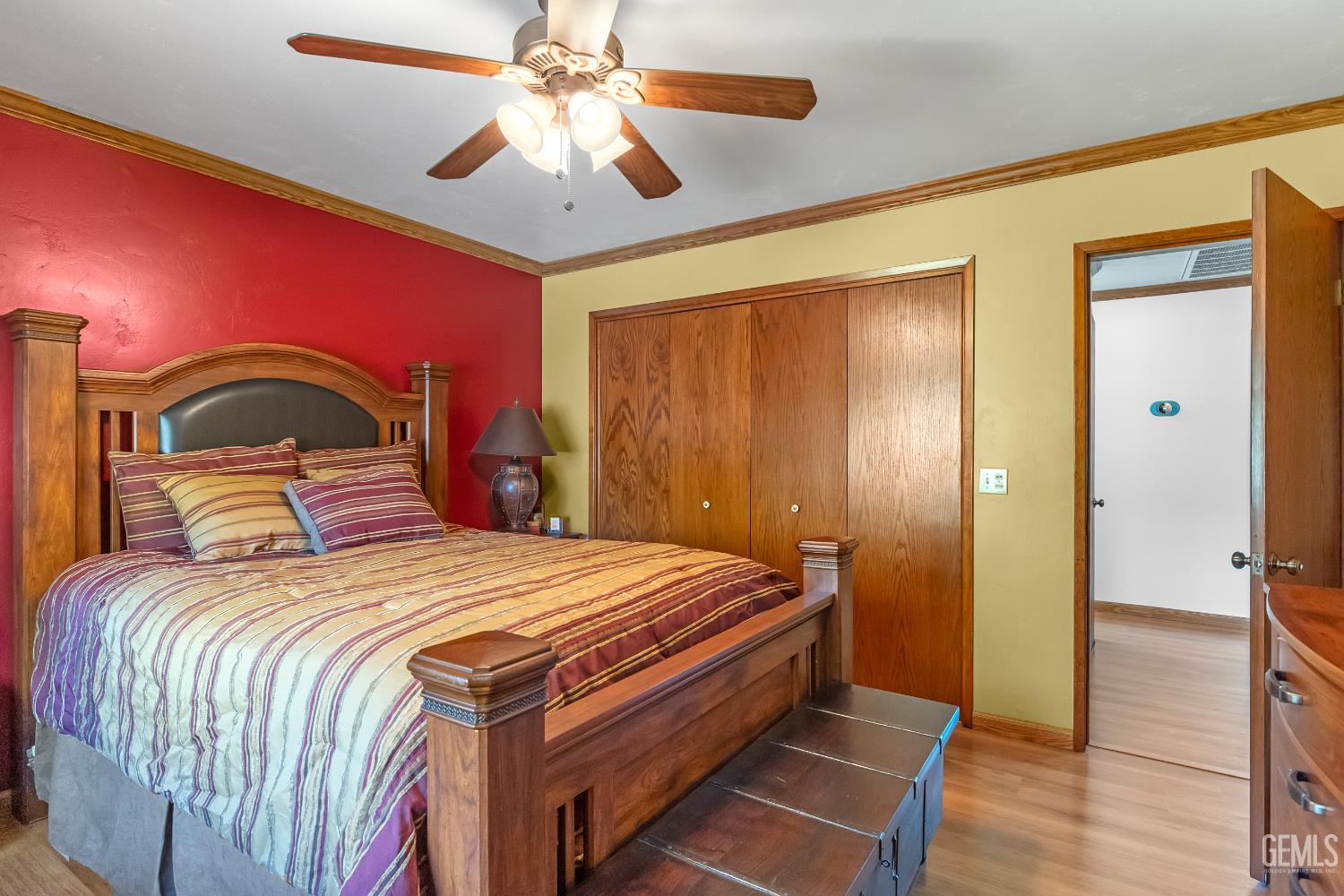 Undisclosed Address Tehachapi, CA 93561 - Photo 39 of 58 a bedroom with a bed and a chandelier