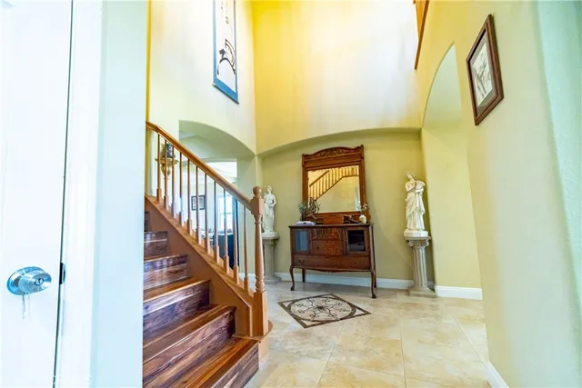 a view of a dining room with furniture and a window