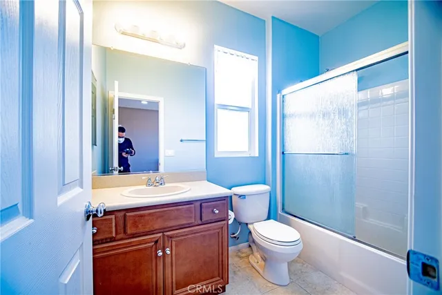 a view of a chairs and table in a porch