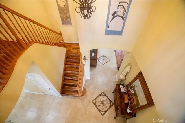 a flower pot with potted plants in front of door