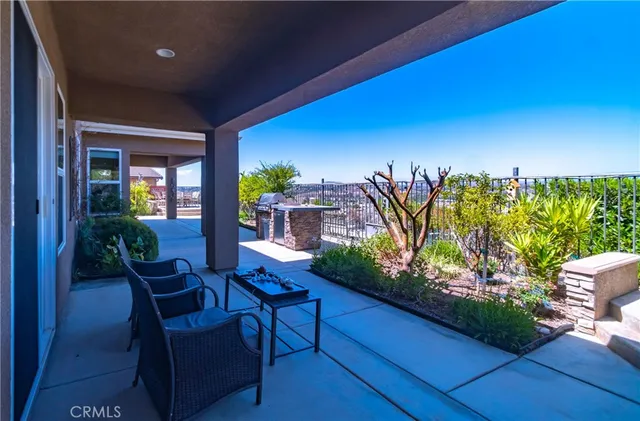an aerial view of a houses with a garden