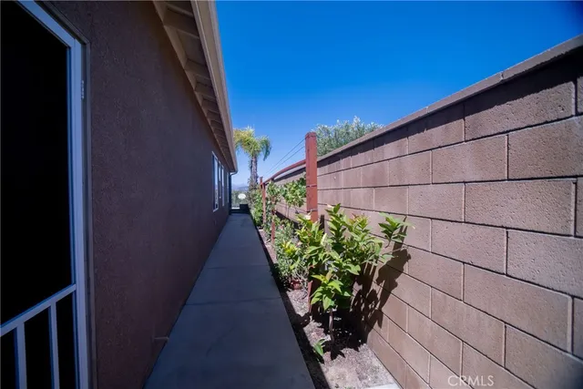 view of a wooden table and chairs in back yard