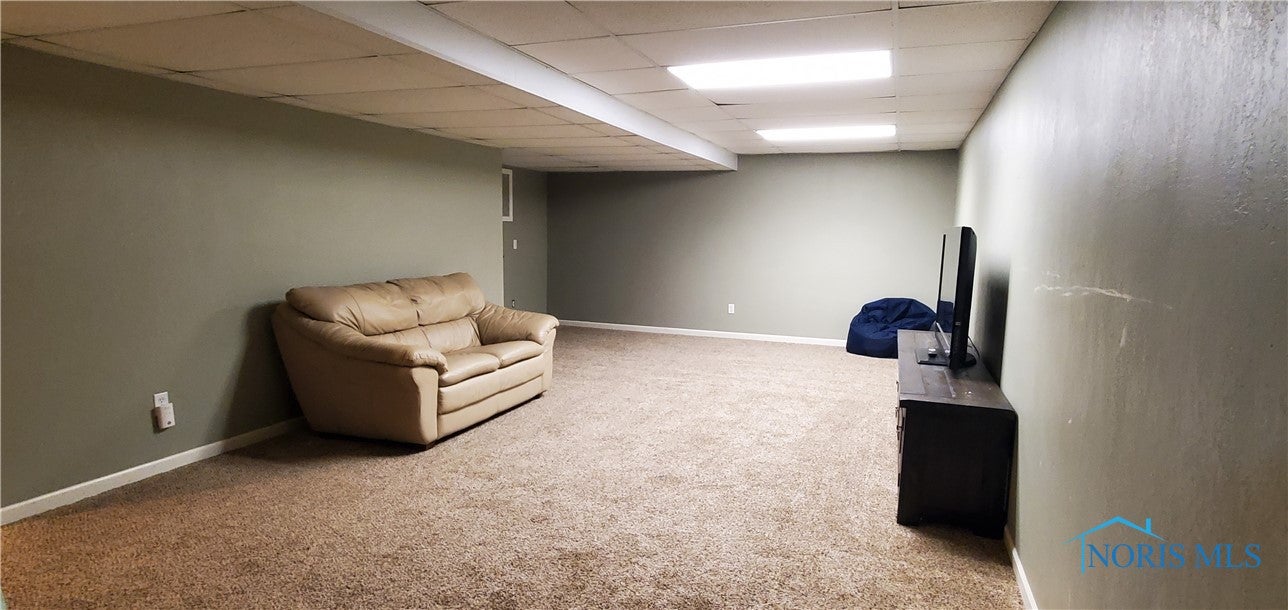 760 Weatherstone Road Holland, OH 43528 - Photo 35 of 44 Finished lower level, newer carpeting and paint.