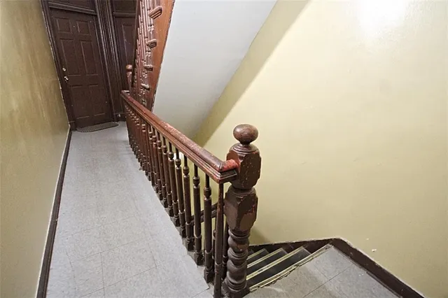 a view of entryway with wooden floor