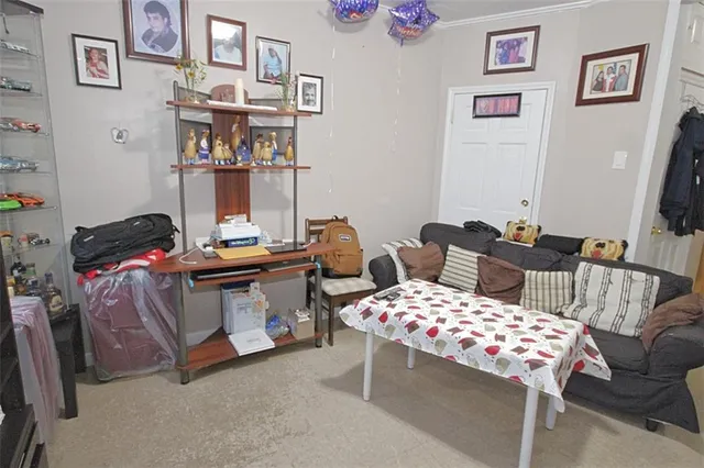 a bedroom with furniture and a bed