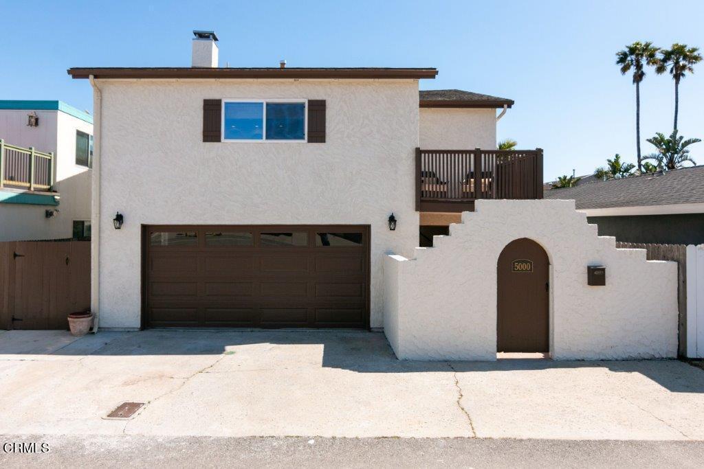 5000 Dolphin Way Oxnard, CA 93035 - Photo 1 of 56 a view of a fireplace with windows