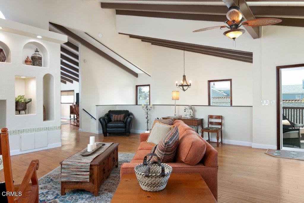 5000 Dolphin Way Oxnard, CA 93035 - Photo 14 of 56 a living room with furniture and a wooden floor