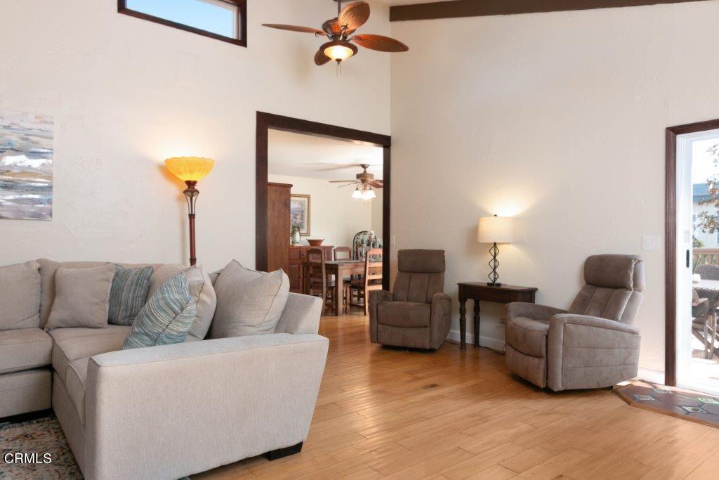 5000 Dolphin Way Oxnard, CA 93035 - Photo 16 of 56 a living room with furniture and a lamp